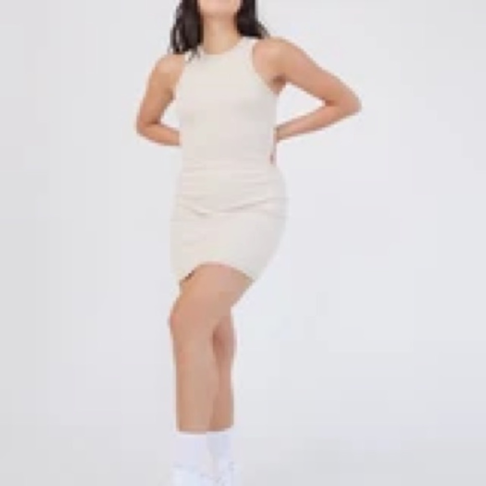 New with tags - Bone colour, racer back knit mini dress